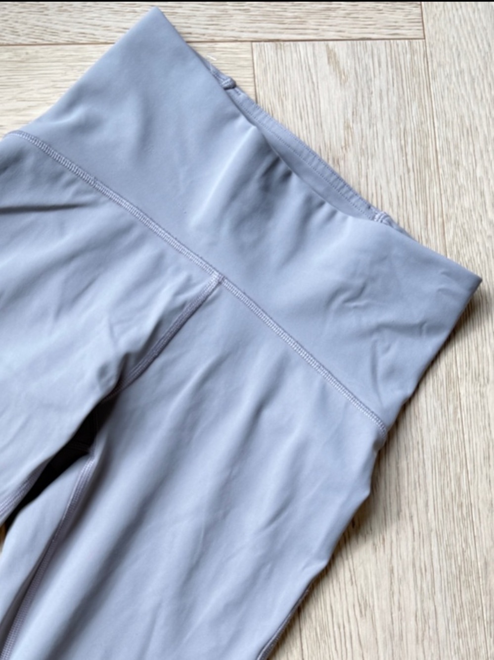 Size 4 Grey Lululemon leggings with adjustable drawstring inside, leg air vents